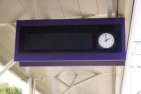 Scoreboard at the station with a clock for the schedule, track and platform,  Stock Photos