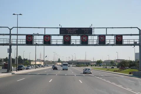 Scoreboard variable information: Attention, speed limit. Airport Highway . Hi Stock Photos