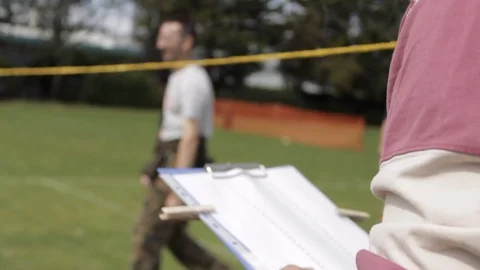 Scorer adjusts points during outdoor summer volleyball tournament Stock-Footage 107626149