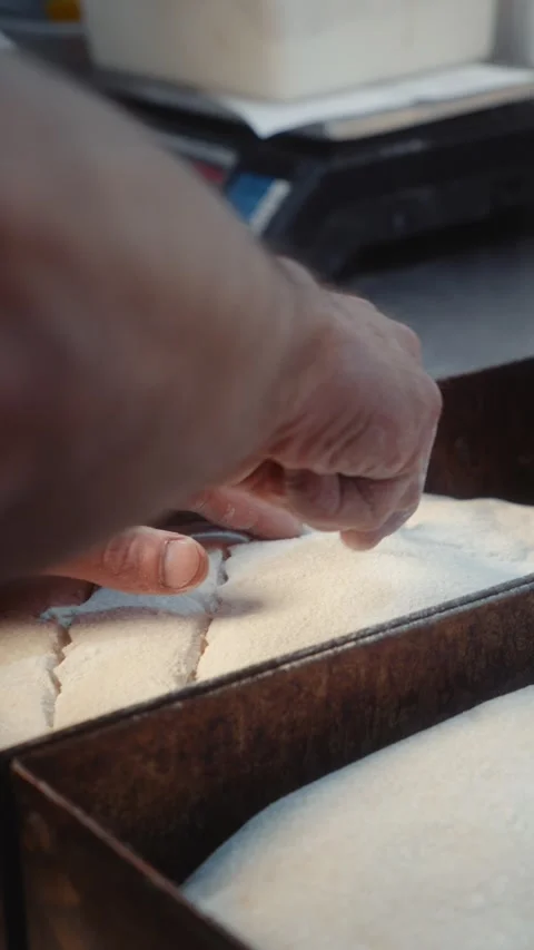 Scoring Bread Dough in Metal Baking Tray with Blade Stock Footage 344313402