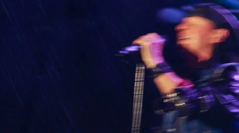 Scorpions performance in the pouring rain at the rock festival The Best City.UA Stock Footage 32327084