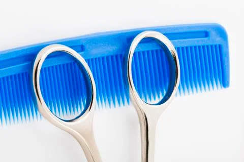 Scossor and comb Stock Photos