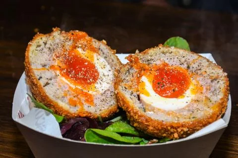 A Scotch egg soft or hard-boiled egg Stock Photos