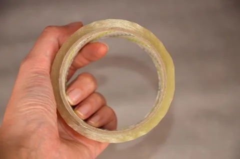 Scotch roll in a hand Foto stock