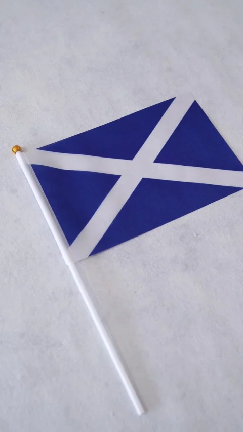 Scotland flag vertical close up on white background. Scottish national flag. Video stock 331054152