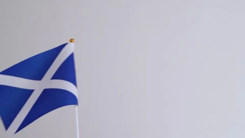 Scotland flag waving on white background. Concept of Scottish country flag Video stock 333676191