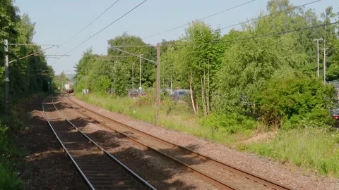 Scotrail electric train approaching Johnstone, Scotland, UK Stock Footage 337648382