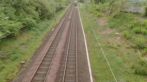 A Scotrail express passenger train on the Glasgow to Edinburgh line. Stock Footage 309958463