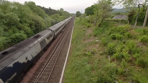 A Scotrail express passenger train on the Glasgow to Edinburgh line. Stock Footage 309958477