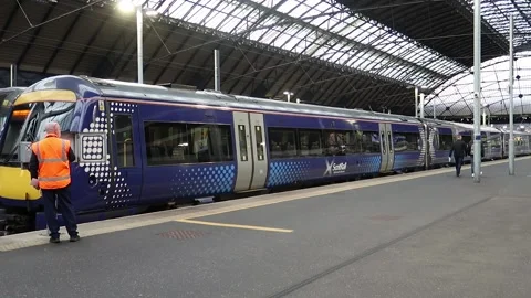 Scotrail train leaving Glasgow Queen Street station Stock Footage 170232451