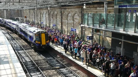 A ScotRail train at the platform at Edinburgh Waverley Station in Scotland Stock Footage 64371304