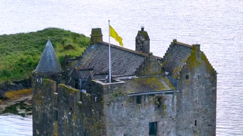 A Scottish castle with a flag on top Stock Footage 306625734