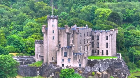 A Scottish castle with a flag on top of it Stock Footage 306642427