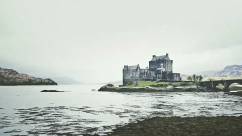 Scottish castle surrounded by mountains Video stock 94658599