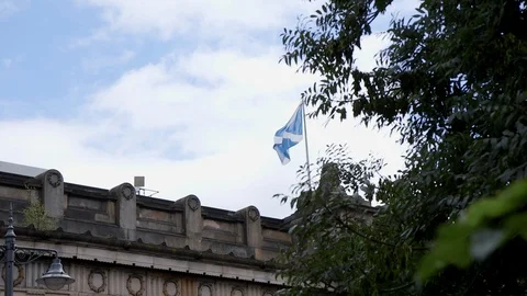 Scottish flag flying in the wind in Edinburgh Stock Footage 112153388