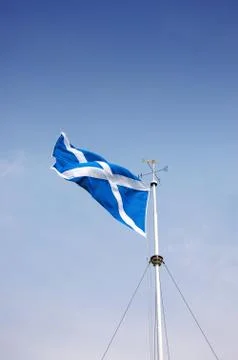 Scottish flag on pole Stock Photos