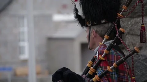 Scottish Highland piper profile medium shot Scotland Stock Footage 58548634