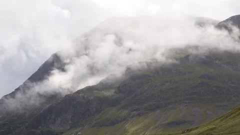 Scottish Highlands in Summer with White Clouds Blowing Across Stock-Footage 97361407