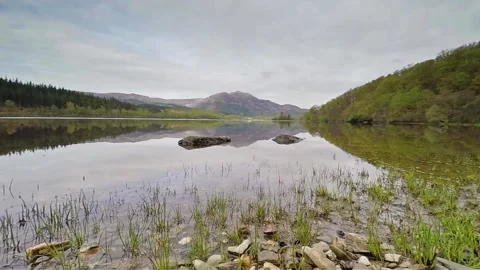 Scottish Loch and mountain with cloud movement Stock Footage 154043236