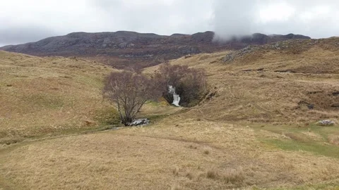 Scottish Outer Hebrides scenic landscape view waterfall nestled in mountains Stock Footage 305536098