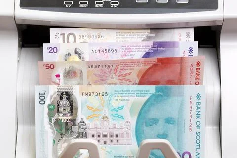 Scottish pound in the counting machine Stock Photos
