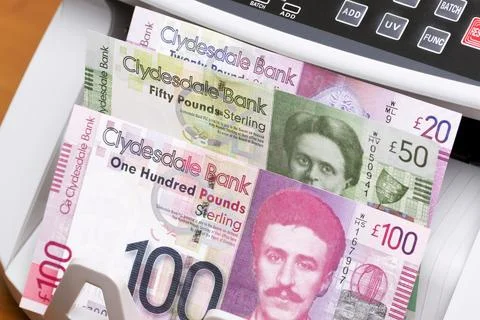 Scottish pound in the counting machine Stock Photos