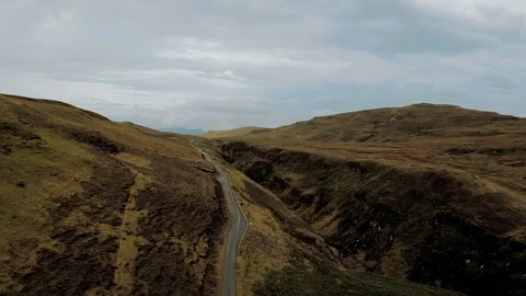 Scottish road in the mountains cloudy day high view Video stock 114276482