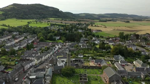 Scottish Round Tower Epic Drone View Revealing Mountain, Abernethy 11th Cent. 4K Stock Footage 145923716