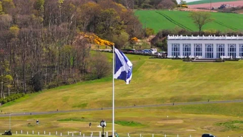 Scottish Saltire Flag Flying Above Countryside Estate Landscape Video stock 335363053