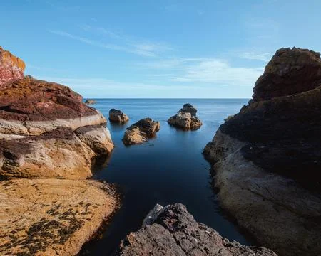 Scottish seashore with cliffs Stock Photos