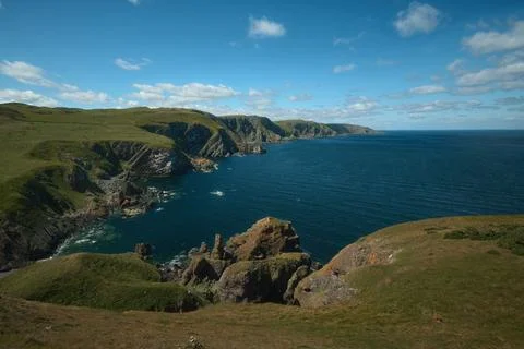 Scottish seashore with cliffs Stock Photos
