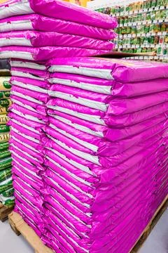 Scotts miracle-gro stack of bagged potting soil display in garden cent Stock Photos