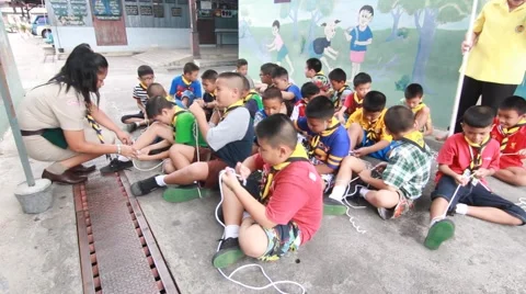 Scout learn usage rope, Scout Camp in primary school Bangkok Thailand Stock Footage 56241460