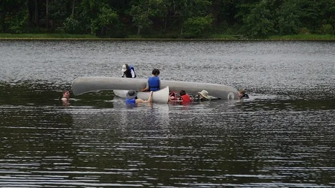 Scouts executing a cross maneuver with 2 canoes 1080p30 스톡 동영상 118614226