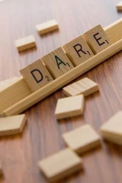 Scrabble letters - DARE Foto stock