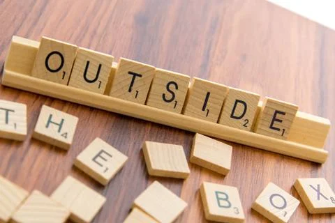 Scrabble letters - OUTSIDE THE BOX Stock Photos