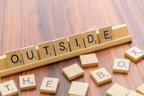 Scrabble letters - OUTSIDE THE BOX Stock Photos