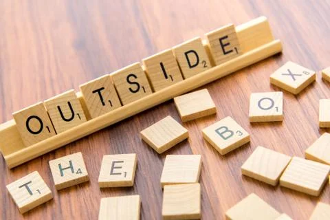 Scrabble letters - OUTSIDE THE BOX Stock Photos