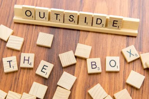 Scrabble letters - OUTSIDE THE BOX Stock Photos