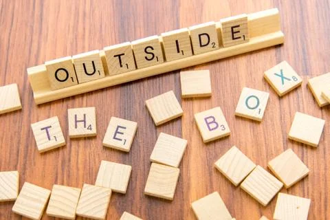 Scrabble letters - OUTSIDE THE BOX Stock Photos