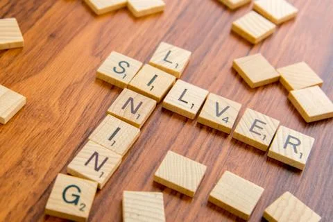 Scrabble letters - SILVER LINING Stock Photos