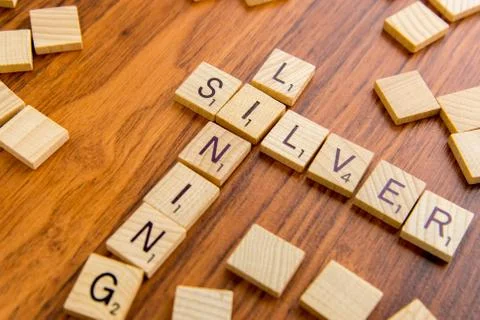 Scrabble letters - SILVER LINING Stock Photos