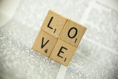 Scrabble Tiles Spell Out Love Stock Photos