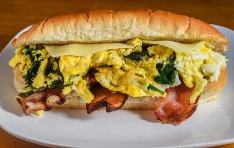 Scramble egg and spinach  sub with bacon  and cheese Stock Photos