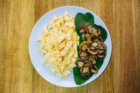 Scramble eggs served for breakfast Stock Photos