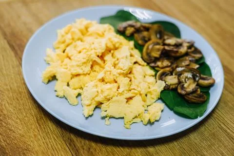Scramble eggs served for breakfast Stock Photos