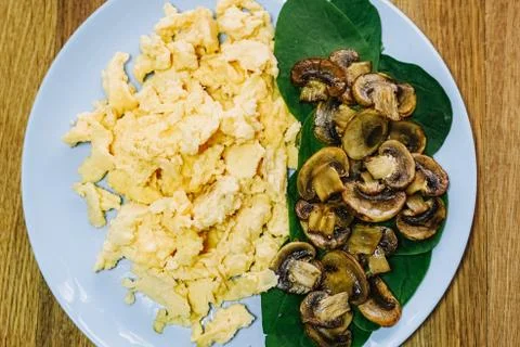 Scramble eggs served for breakfast Stock Photos