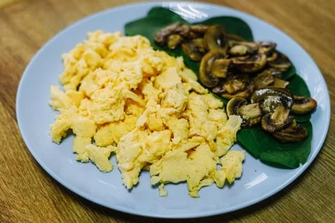 Scramble eggs served for breakfast Stock Photos
