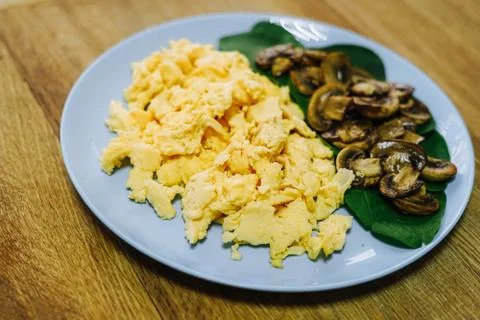 Scramble eggs served for breakfast Stock Photos