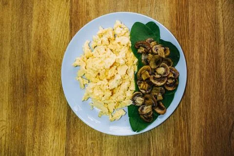 Scramble eggs served for breakfast Stock Photos